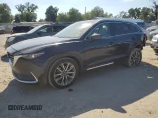 ✅ 2018 Mazda CX-9 Grand Touring • VIN: JM3TCADY2J0210957 • Lot: 82531835. Listed on Copart with 128,720 mi. Free auction sales archive from the USA and detailed vehicle history report at DreamBid. Image 1.