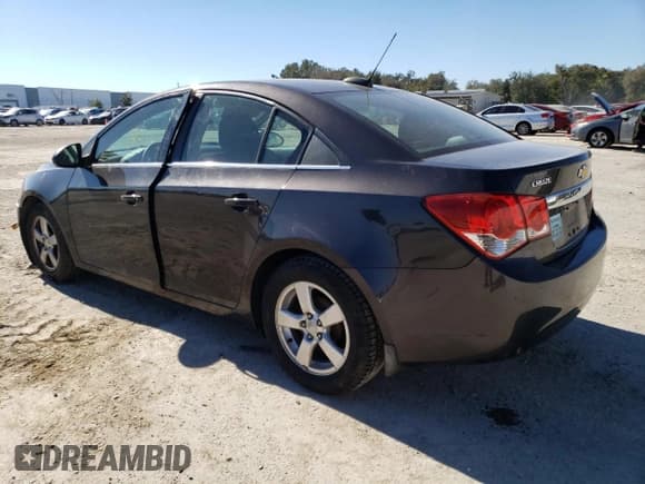 ✅ 2015 Chevrolet Cruze LT • VIN: 1G1PC5SB4F7205220 • Lot: 37124343. Listed on Copart with 119,522 mi. Free auction sales archive from the USA and detailed vehicle history report at DreamBid. Image 2.