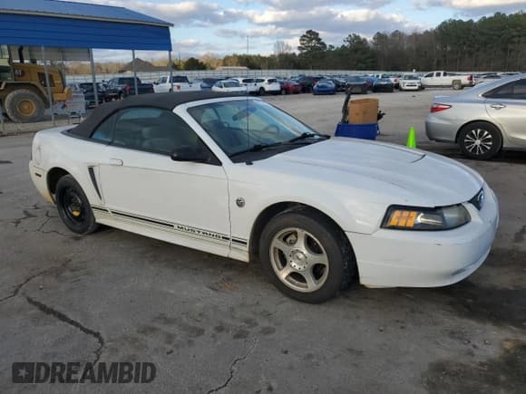 ✅ 2004 Ford Mustang Deluxe • VIN: 1FAFP44634F136739 • Lot: 44078925. Listed on Copart with 105,591 mi. Free auction sales archive from the USA and detailed vehicle history report at DreamBid. Image 4.