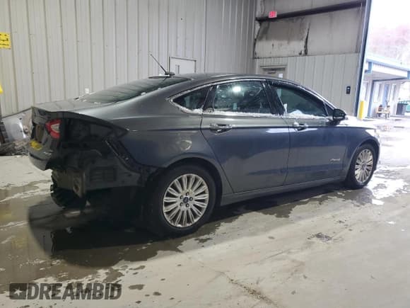 ✅ 2015 Ford Fusion SE Hybrid • VIN: 3FA6P0LU6FR252127 • Lot: 91671915. Listed on Copart with 313,804 mi. Free auction sales archive from the USA and detailed vehicle history report at DreamBid. Image 3.