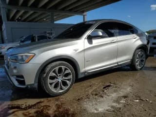 ✅ 2015 BMW X4 xDrive28i • VIN: 5UXXW3C50F0M88914 • Lot: 89833905. Wystawiony na Copart z przebiegiem 87 775 mil. Bezpłatny archiwum sprzedaży aukcyjnych z USA i szczegółowy raport historii pojazdu na DreamBid. Zdjęcie 1.