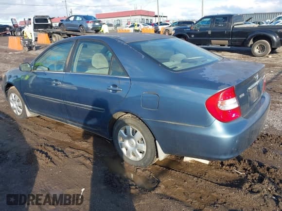 ✅ 2003 Toyota Camry LE • VIN: 4T1BE32K43U763271 • Lot: 43762985. Listed on IAAI with 234,811 mi. Free auction sales archive from the USA and detailed vehicle history report at DreamBid. Image 3.