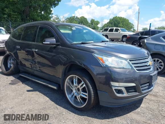 2014 Chevrolet Traverse LT z VIN 1GNKRGKD6EJ290499, wystawiony jako IAAI lot #42604884 z przebiegiem 169 701 mil mil oraz . Historia ofert i sprzedaży dostępna na DreamBid. Obrazek 1.