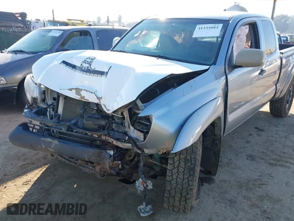 ✅ 2015 Toyota Tacoma • VIN: 5TFUU4EN6FX125019 • Лот: 41335084. Опубликован ранее на IAAI с пробегом 211 855 миль. Бесплатный доступ к архиву аукционных продаж из США и подробный отчёт об истории автомобиля на DreamBid. Изображение 6.