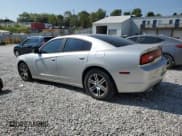 ✅ 2012 Dodge Charger Police • VIN: 2C3CDXAG3CH147889 • Lot: 81496185. Listed on Copart with 215,314 mi. Free auction sales archive from the USA and detailed vehicle history report at DreamBid. Image 2.