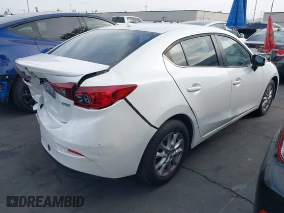 ✅ 2016 Mazda 3 i Touring • VIN: JM1BM1W75G1303299 • Lot: 43681228. Listed on IAAI with 102,066 mi. Free auction sales archive from the USA and detailed vehicle history report at DreamBid. Image 4.