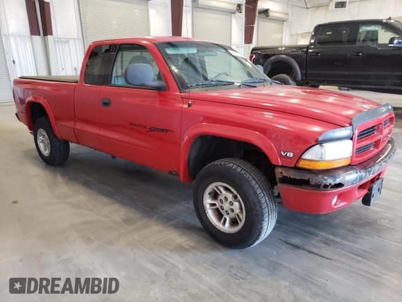 ✅ 1999 Dodge Dakota SLT • VIN: 1B7GG22YXXS215599 • Lot: 54630655. Wystawiony na Copart z przebiegiem 141 255 mil. Bezpłatny archiwum sprzedaży aukcyjnych z USA i szczegółowy raport historii pojazdu na DreamBid. Zdjęcie 4.