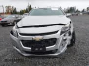 ✅ 2015 Chevrolet Malibu LTZ • VIN: 1G11F5SL3FF282110 • Lot: 43516279. Listed on IAAI with 131,961 mi. Free auction sales archive from the USA and detailed vehicle history report at DreamBid. Image 12.