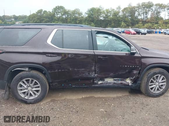 2023 Chevrolet Traverse LT Cloth with VIN 1GNEVGKW1PJ184457, listed as a IAAI auction lot 43392256 with 56,213 mi miles and . Bid and sale history available at DreamBid. Image 13.