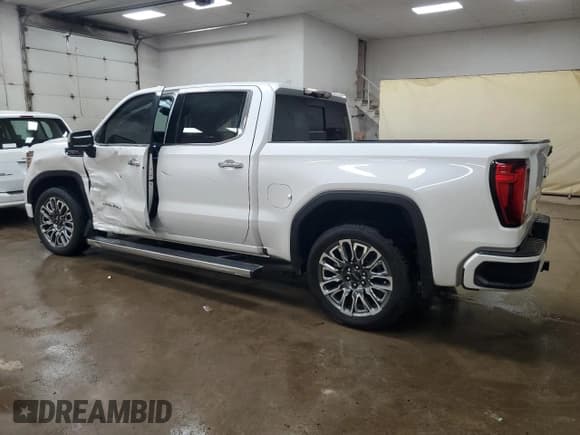 ✅ 2023 GMC Sierra 1500 Denali Ultimate • VIN: 1GTUUHELXPZ237477 • Лот: 67481445. Опубликован ранее на Copart с пробегом 48 127 миль. Бесплатный доступ к архиву аукционных продаж из США и подробный отчёт об истории автомобиля на DreamBid. Изображение 2.