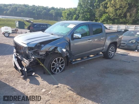 ✅ 2020 GMC Canyon 4WD Denali • VIN: 1GTG6EEN2L1250319 • Lot: 42718120. Listed on IAAI with Not provided. Free auction sales archive from the USA and detailed vehicle history report at DreamBid. Image 2.