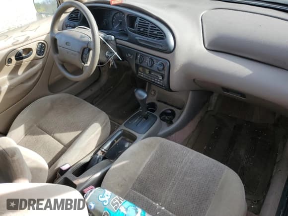 ✅ 1999 Ford Contour SE • VIN: 1FAFP6634XK189850 • Lot: 85124605. Listed on Copart with 48,359 mi. Free auction sales archive from the USA and detailed vehicle history report at DreamBid. Image 8.