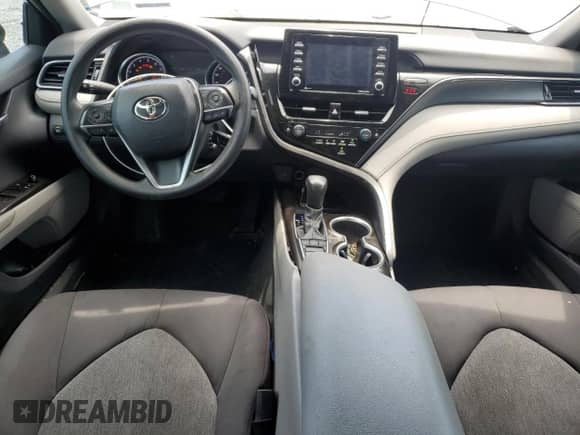 2023 Toyota Camry LE с VIN 4T1C11BK1PU102890, выставлен на аукционе Copart как лот 62864095 с пробегом 67 528 миль миль и Списание • Salvage title. История ставок и продаж доступна на DreamBid. Изображение 8.