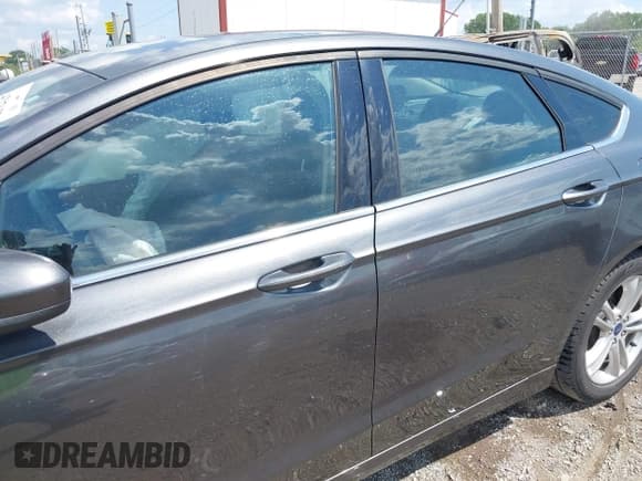 ✅ 2018 Ford Fusion SE • VIN: 3FA6P0HDXJR193777 • Lot: 42926576. Listed on IAAI with 59,726 mi. Free auction sales archive from the USA and detailed vehicle history report at DreamBid. Image 14.