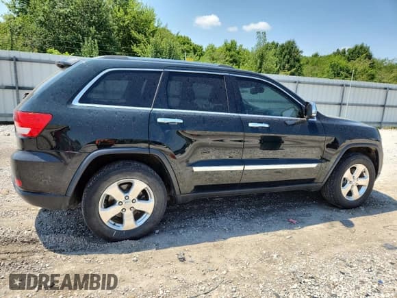 ✅ 2013 Jeep Grand Cherokee Limited • VIN: 1C4RJEBG2DC569402 • Lot: 68589505. Listed on Copart with 156,308 mi. Free auction sales archive from the USA and detailed vehicle history report at DreamBid. Image 3.