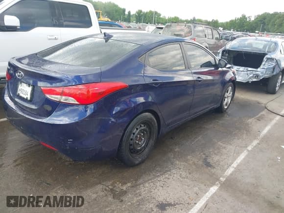 ✅ 2013 Hyundai Elantra GLS • VIN: 5NPDH4AE3DH336780 • Lot: 42226503. Listed on IAAI with 202,750 mi. Free auction sales archive from the USA and detailed vehicle history report at DreamBid. Image 4.