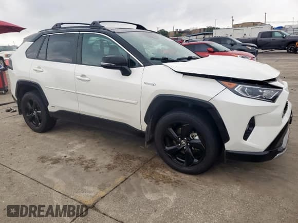 ✅ 2021 Toyota RAV4 Hybrid XSE • VIN: 4T3E6RFVXMU043452 • Lot: 55076405. Listed on Copart with 86,516 mi. Free auction sales archive from the USA and detailed vehicle history report at DreamBid. Image 4.