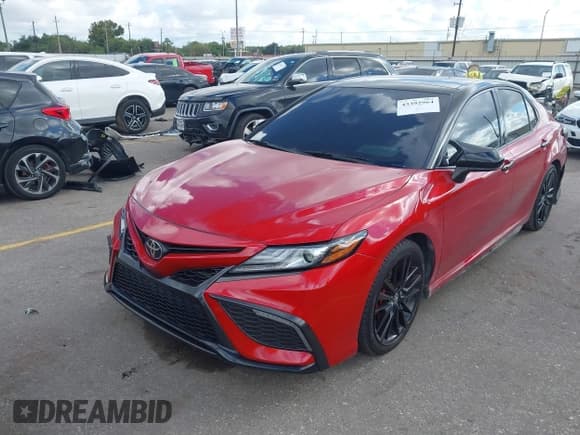 ✅ 2022 Toyota Camry XSE • VIN: 4T1K61AK3NU021224 • Lot: 43392964. Listed on IAAI with 57,745 mi. Free auction sales archive from the USA and detailed vehicle history report at DreamBid. Image 2.