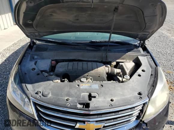 2013 Chevrolet Traverse LT с VIN 1GNKRGKD9DJ137145, выставлен на аукционе Copart как лот 86336175 с пробегом 283 617 миль миль и Списание • Salvage title. История ставок и продаж доступна на DreamBid. Изображение 12.