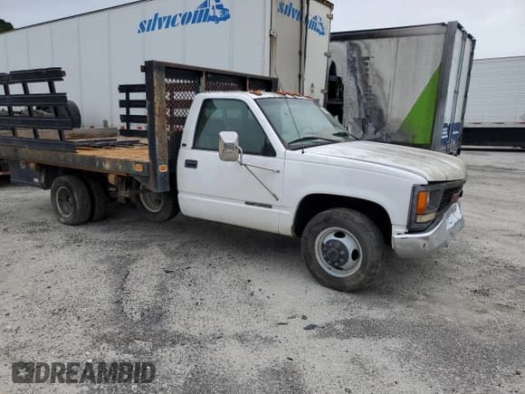 ✅ 1999 GMC Sierra 1500 • VIN: 1GDJC34R3XF087014 • Lot: 86367084. Wystawiony na Copart z przebiegiem 94 539 mil. Bezpłatny archiwum sprzedaży aukcyjnych z USA i szczegółowy raport historii pojazdu na DreamBid. Zdjęcie 4.