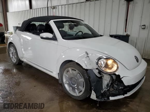 ✅ 2014 Volkswagen Beetle 2.5L w/Sound/Nav • VIN: 3VW5P7AT3EM801803 • Lot: 48462755. Listed on Copart with 73,752 mi. Free auction sales archive from the USA and detailed vehicle history report at DreamBid. Image 4.
