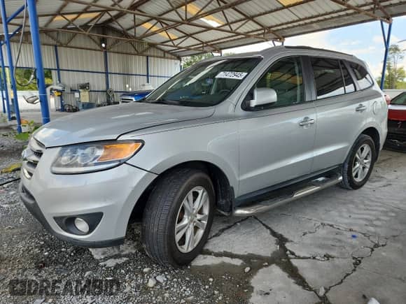 2012 Hyundai Santa Fe SE z VIN 5XYZHDAG9CG106013, wystawiony jako Copart lot #71472945 z przebiegiem 123 920 mil mil oraz Szkoda całkowita • Salvage title. Historia ofert i sprzedaży dostępna na DreamBid. Obrazek 1.