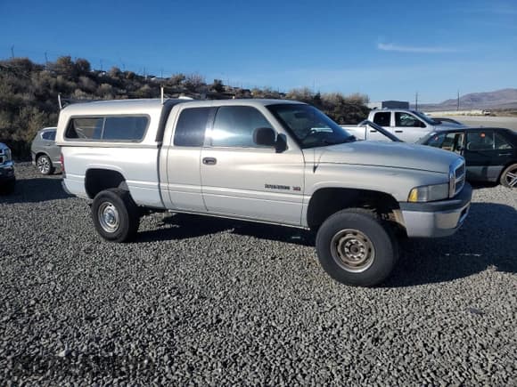 ✅ 2001 Dodge 2500 • VIN: 3B7KF23Z71G180443 • Lot: 82716745. Listed on Copart with 353,149 mi. Free auction sales archive from the USA and detailed vehicle history report at DreamBid. Image 4.