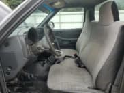 ✅ 2001 GMC Sonoma SL • VIN: 1GTCS14581K143450 • Лот: 67524905. Опубликован ранее на Copart с пробегом Не указан. Бесплатный доступ к архиву аукционных продаж из США и подробный отчёт об истории автомобиля на DreamBid. Изображение 7.