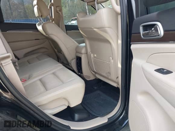 2018 Jeep Grand Cherokee Sterling z VIN 1C4RJFBGXJC425372, wystawiony jako IAAI lot #43595448 z przebiegiem 138 472 mil mil oraz . Historia ofert i sprzedaży dostępna na DreamBid. Obrazek 8.