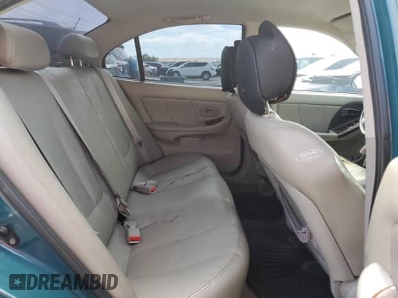 2006 Hyundai Elantra GLS z VIN KMHDN46D66U245743, wystawiony jako Copart lot #70051045 z przebiegiem 124 419 mil mil oraz Szkoda całkowita • Salvage title. Historia ofert i sprzedaży dostępna na DreamBid. Obrazek 10.