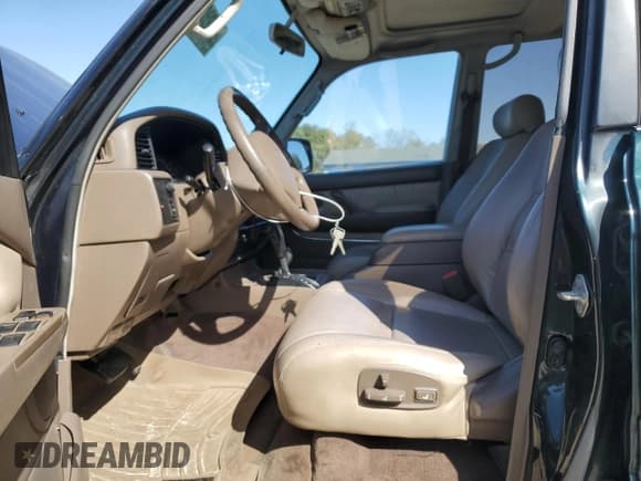 ✅ 1995 Toyota Land Cruiser • VIN: JT3DJ81W6S0106332 • Lot: 47772055. Listed on Copart with 214,499 mi. Free auction sales archive from the USA and detailed vehicle history report at DreamBid. Image 7.