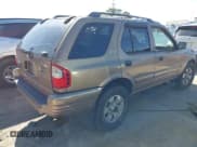 ✅ 2001 Isuzu Rodeo S • VIN: 4S2CK58W414322118 • Лот: 41496624. Опубликован ранее на IAAI с пробегом 244 189 миль. Бесплатный доступ к архиву аукционных продаж из США и подробный отчёт об истории автомобиля на DreamBid. Изображение 4.