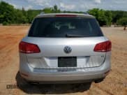 ✅ 2013 Volkswagen Touareg Exec • VIN: WVGEF9BP7DD008870 • Lot: 56552285. Listed on Copart with 234,609 mi. Free auction sales archive from the USA and detailed vehicle history report at DreamBid. Image 6.