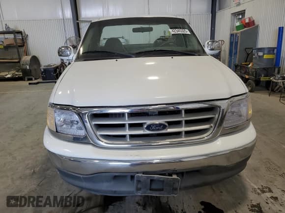 ✅ 2001 Ford F-150 XL • VIN: 1FTRF17W31NA23928 • Lot: 42345325. Listed on Copart with 164,319 mi. Free auction sales archive from the USA and detailed vehicle history report at DreamBid. Image 5.