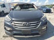 ✅ 2018 Hyundai Santa Fe 2.0T • VIN: 5XYZU4LA4JG529079 • Лот: 81975085. Опубликован ранее на Copart с пробегом 164 631 миль. Бесплатный доступ к архиву аукционных продаж из США и подробный отчёт об истории автомобиля на DreamBid. Изображение 5.