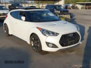 ✅ 2014 Hyundai Veloster Turbo • VIN: KMHTC6AE9EU201750 • Lot: 40691529. Wystawiony na IAAI z przebiegiem 87 958 mil. Bezpłatny archiwum sprzedaży aukcyjnych z USA i szczegółowy raport historii pojazdu na DreamBid. Zdjęcie 1.