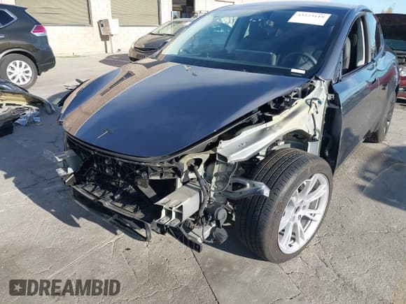 ✅ 2023 Tesla Model Y • VIN: 7SAYGDED5PF980132 • Lot: 43573118. Listed on IAAI with 30,165 mi. Free auction sales archive from the USA and detailed vehicle history report at DreamBid. Image 6.