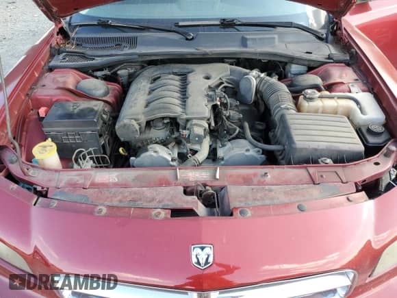 2009 Dodge Charger SXT with VIN 2B3KA33V49H601520, listed as a Copart auction lot 68101594 with 198,802 mi miles and Salvage title. Bid and sale history available at DreamBid. Image 13.