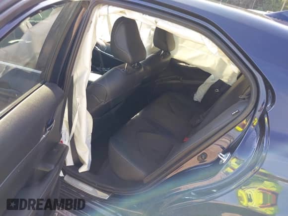 2021 Toyota Camry XSE with VIN 4T1K61AK4MU615383, listed as a IAAI auction lot 43193305 with 57,706 mi miles and . Bid and sale history available at DreamBid. Image 8.