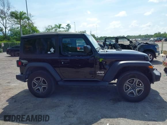 ✅ 2019 Jeep Wrangler Sport S • VIN: 1C4GJXAG2KW664395 • Lot: 42683888. Listed on IAAI with 72,742 mi. Free auction sales archive from the USA and detailed vehicle history report at DreamBid. Image 13.