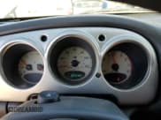 ✅ 2003 Chrysler PT Cruiser Touring • VIN: 3C4FY58BX3T598160 • Lot: 69841335. Wystawiony na Copart z przebiegiem 159 289 mil. Bezpłatny archiwum sprzedaży aukcyjnych z USA i szczegółowy raport historii pojazdu na DreamBid. Zdjęcie 9.