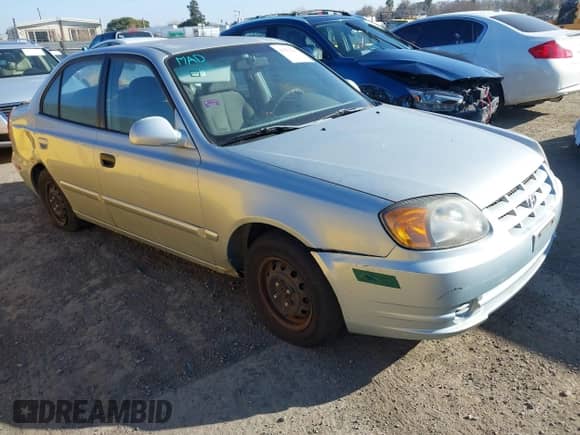 2004 Hyundai Accent GL with VIN KMHCG45C14U547954, listed as a IAAI auction lot 41350219 with 138,436 mi miles and . Bid and sale history available at DreamBid. Image 1.