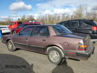 ✅ 1989 Pontiac 6000 • VIN: 1G2AF51W2K6261413 • Lot: 89732395. Wystawiony na Copart z przebiegiem 61 385 mil. Bezpłatny archiwum sprzedaży aukcyjnych z USA i szczegółowy raport historii pojazdu na DreamBid. Zdjęcie 2.