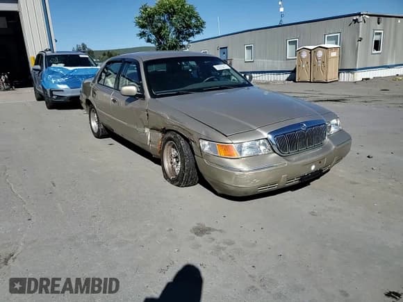 ✅ 2000 Mercury Grand Marquis LS • VIN: 2MEFM75W0YX601831 • Lot: 85825815. Wystawiony na Copart z przebiegiem 184 307 mil. Bezpłatny archiwum sprzedaży aukcyjnych z USA i szczegółowy raport historii pojazdu na DreamBid. Zdjęcie 13.