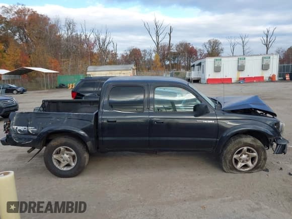 ✅ 2003 Toyota Tacoma PreRunner • VIN: 5TEGN92N63Z300661 • Lot: 43680659. Listed on IAAI with 246,390 mi. Free auction sales archive from the USA and detailed vehicle history report at DreamBid. Image 13.
