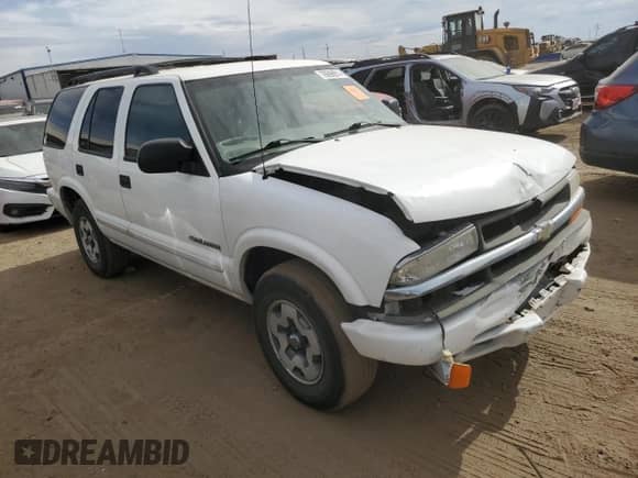 2004 Chevrolet Blazer LS z VIN 1GNDT13X74K161079, wystawiony jako Copart lot #76698914 z przebiegiem 123 726 mil mil oraz Szkoda całkowita • Salvage title. Historia ofert i sprzedaży dostępna na DreamBid. Obrazek 4.