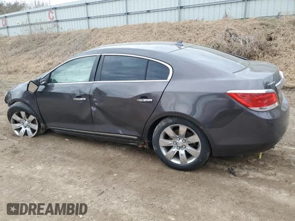 ✅ 2012 Buick LaCrosse Leather • VIN: 1G4GC5E33CF328497 • Lot: 59272565. Wystawiony na Copart z przebiegiem 175 579 mil. Bezpłatny archiwum sprzedaży aukcyjnych z USA i szczegółowy raport historii pojazdu na DreamBid. Zdjęcie 2.