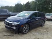 ✅ 2022 Honda Odyssey Touring • VIN: 5FNRL6H80NB022004 • Lot: 43326019. Wystawiony na IAAI z przebiegiem 60 000 mil. Bezpłatny archiwum sprzedaży aukcyjnych z USA i szczegółowy raport historii pojazdu na DreamBid. Zdjęcie 19.