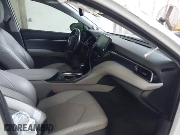 2022 Toyota Camry Hybrid XLE with VIN 4T1F31AK4NU572580, listed as a IAAI auction lot 42244158 with 69,247 mi miles and . Bid and sale history available at DreamBid. Image 5.