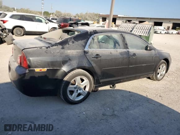 ✅ 2012 Chevrolet Malibu 1LS • VIN: 1G1ZB5E01CF168067 • Lot: 71671704. Listed on Copart with 169,599 mi. Free auction sales archive from the USA and detailed vehicle history report at DreamBid. Image 3.